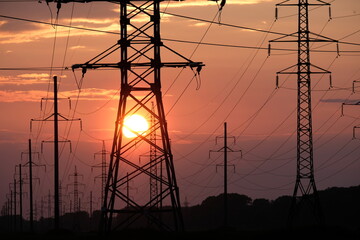 metal poles with electric wires from power plant