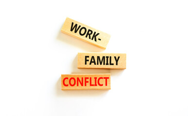 Work-family conflict symbol. Concept words Work-family conflict on wooden block on a beautiful white table white background. Business work-family conflict concept. Copy space.