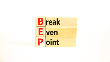 BEP break even point symbol. Concept words BEP break even point on wooden blocks on a beautiful white table white background. Business and BEP break even point concept. Copy space.