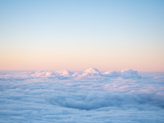 Fototapeta na wymiar beautiful sunrise over inversion clouds. Minimalism background