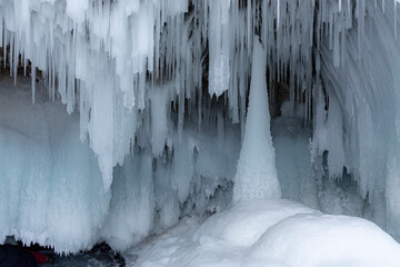 Ice cave on a frozen lake