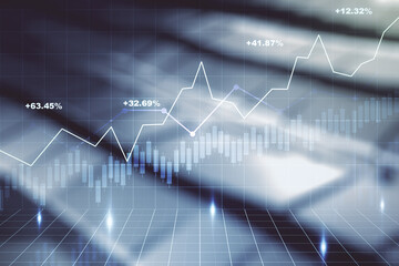 Double exposure of abstract creative financial chart hologram on blurry metal background, research and strategy concept