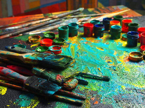 Palette and brushes in the art studio
