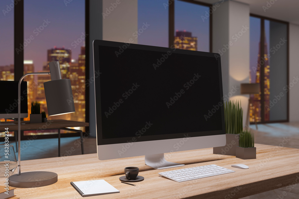 Poster Close up of designer office desktop with empty black computer monitor, window with night city view, decorative items and supplies. Mock up, 3D Rendering.