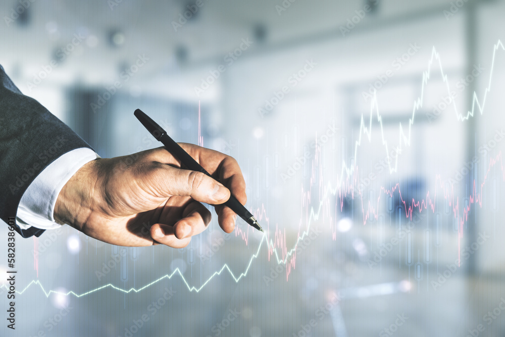 Poster multi exposure of analyst hand with pen working with virtual abstract financial diagram on blurred o
