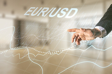Fototapeta na wymiar Double exposure of male hand clicks on abstract virtual EURO USD forex chart hologram on blurred office background. Banking and investing concept