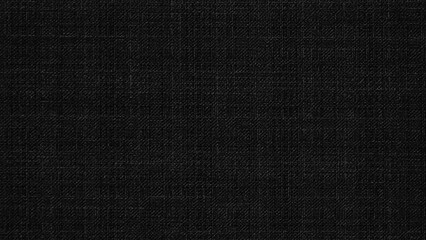 Black cotton fabric texture background. Detail of canvas textile material.