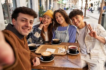 Coffee time with friends from around the world, capturing memories with a selfie