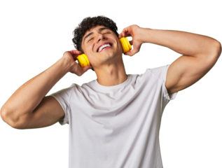 A young man enjoys his favorite tunes in high-quality sound, using wireless headphones for a relaxing and entertaining audio experience.