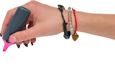 The girl's hand holds a felt-tip pen on a light background