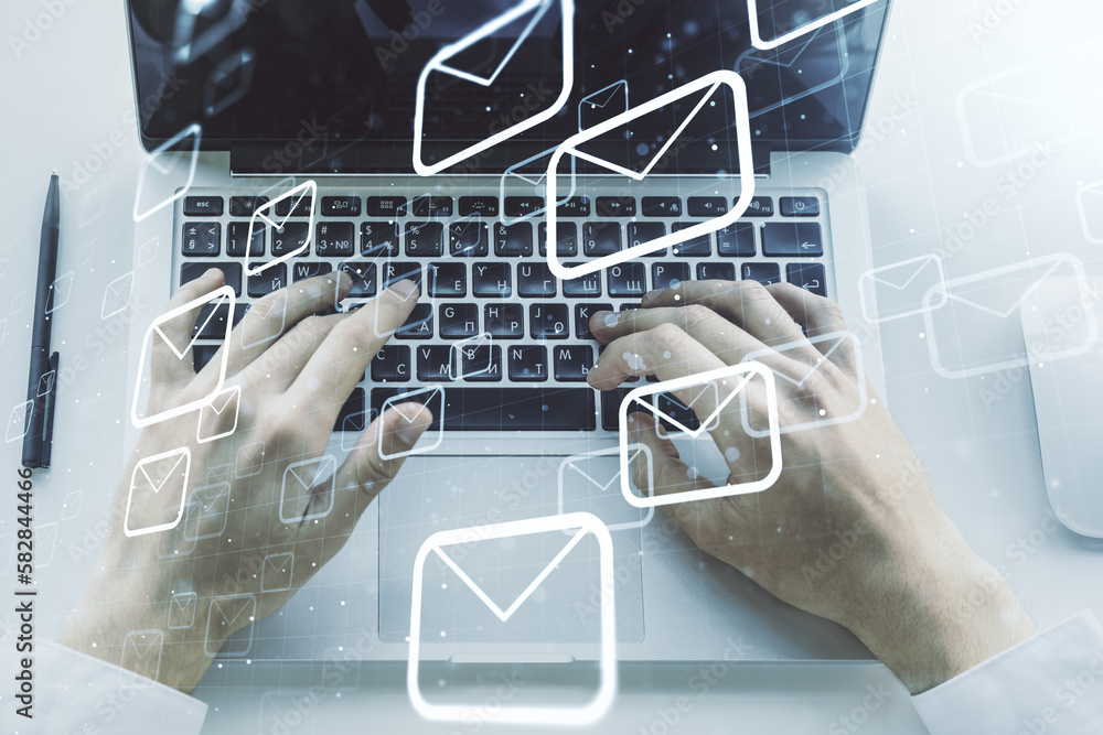 Poster creative abstract postal envelopes hologram with hands typing on computer keyboard on background, em