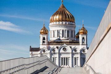 Russian Orthodox Cathedral - The Cathedral of Christ the Savior in Moscow against the blue sky on a sunny spring day. Russian Federation, Moscow.