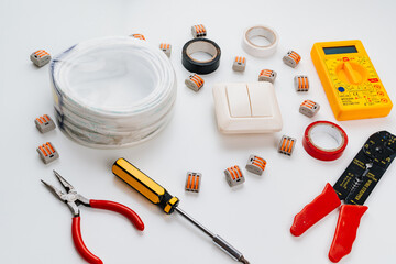 working tools for an electrician on a white background.