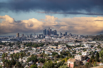 Fototapeta premium Hilltop view of downtown Los Angeles California with storm clouds.