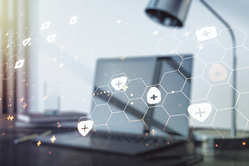 Fototapeta premium Creative concept of abstract medical illustration on modern laptop background. Medicine and healthcare concept. Multiexposure