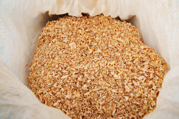 sawdust and shavings in bag. material for agriculture. mulch 