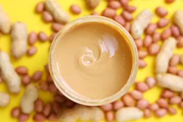 Obraz na płótnie Canvas peanut butter on a colored background