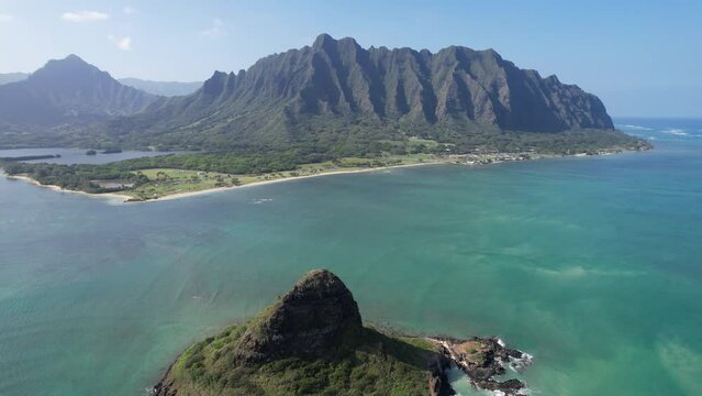 Aerial view of the Koolau Mountain Range on the east side of Oahu with Chinaman's Hat (Mokolii Island) in the foreground