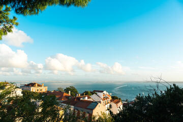 Fototapeta na wymiar Aerial panoramic view of Lisbon, Portugal. Drone photo of the Lisbon old town skyline. Historical district in capital city of Portugal