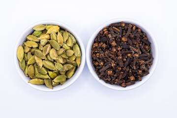 Cardamom, and Cloves in bowls