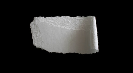 a white piece of paper on a black isolated background