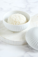 cooked rice in white ceramic bowl