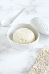 cooked rice in white ceramic bowl