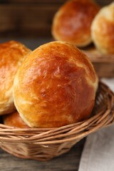 Freshly baked soda water scones on wooden table, closeup