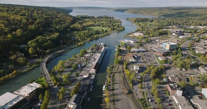 Early afternoon autumn aerial video of Ithaca New York near the inlet to Cayuga Lake.	