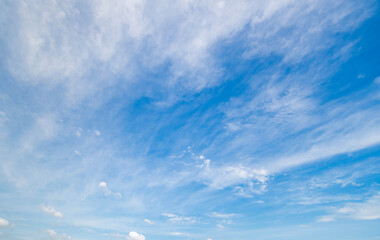 Panoramic view of clear blue sky and clouds, Blue sky background with tiny clouds. White fluffy clouds in the blue sky.