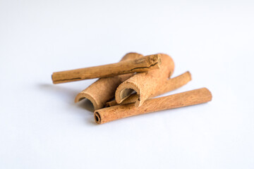 Cinnamon sticks, isolated on white background. Copy space.