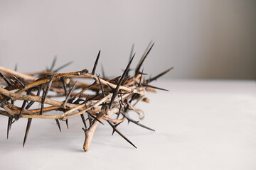 Jesus Crown Thorns and nails and cross on a white background. Crucifixion Of Jesus Christ. Passion Of Jesus Christ. Concept for faith, spirituality and religion. Easter Day - obrazy, fototapety, plakaty