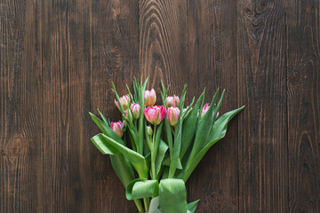 Bouquet of pink fresh tulips. Beautiful Card for Mother's Day or Women's Day.