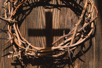 Jesus Crown Thorns and nails and cross on a wood background. Crucifixion Of Jesus Christ. Passion...