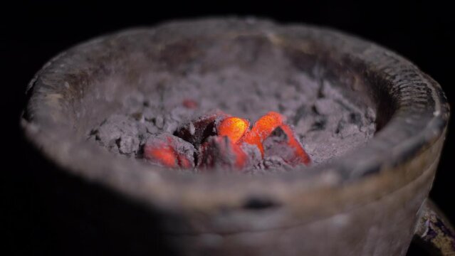 coal burning inside incense burner tradition house perfume in Yemen Arab region
