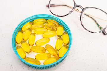 Eye Care Fish Oil Capsules and Glasses