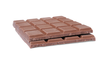 Pieces of tasty milk chocolate bar isolated on white