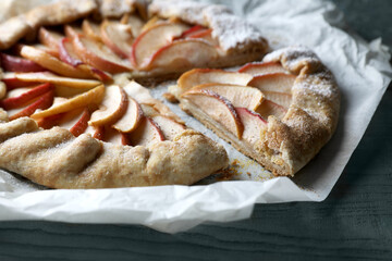 Delicious apple galette on wooden table, closeup