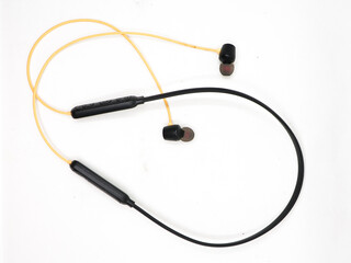 wireless bluetooth earphones with neckband isolated in a white background