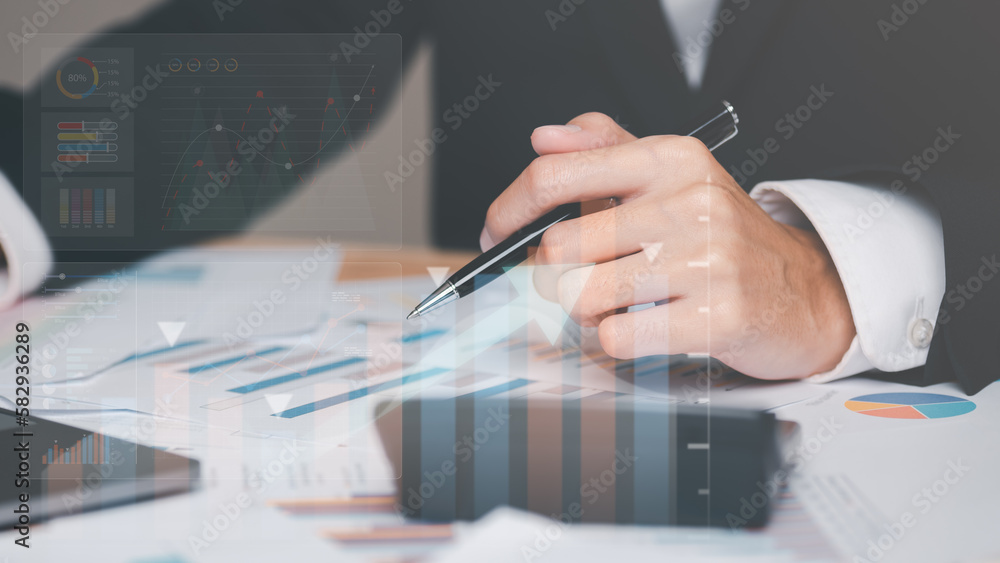 Poster Businessman reading graph report and business statistics charts ,Analysis and improvement of corporate strategy,manage financial and marketing documents , Statistics and Data Concepts,business growth