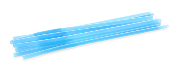 Light blue plastic cocktail straws on white background