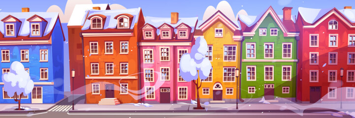 Fototapeta premium Snow in scandinavian city street with traditional buildings. Vector cartoon illustration of cozy winter town with old houses, white roofs, trees and lanterns on sidewalk. Blizzard and cold weather