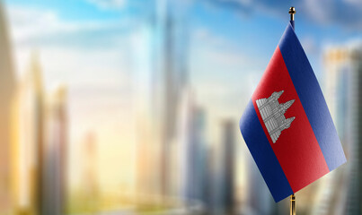 A small Cambodia flag on an abstract blurry background
