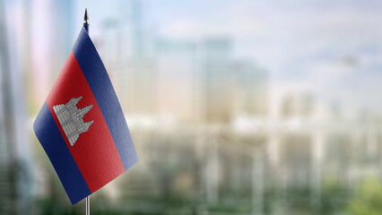 A small Cambodia flag on an abstract blurry background