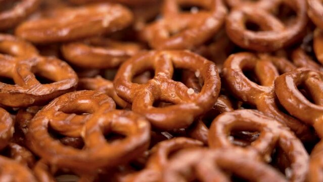 Bavarian pretzel crackers close up. Traditional German snack. Rotation.