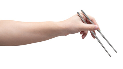 isolated of a woman's hand holding a silver chopstick.