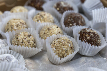 Handmade sweets with seeds and nuts. Healthy sweets. Selective focus. Close-up.