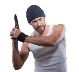Handsome criminal holding a gun