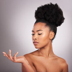 Beauty, skincare and hand of black woman with product placement for cosmetics on white background....