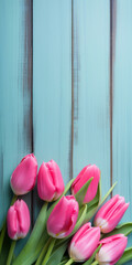 Tulip border with copy space. Bouquet of pink tulips flowers on turquoise blue vintage wooden background. generative ai. Beautiful frame composition of spring flowers